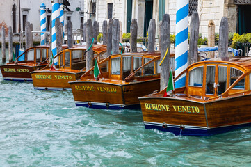 Fototapeta na wymiar Water taxis in the canal in Venice