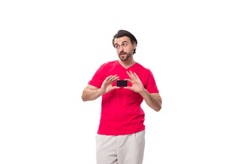 young brunette advertiser man holding plastic credit card