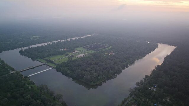 Slow pushing forward aerial timelapse during the sunset of Angkor Wat in Cambodia.