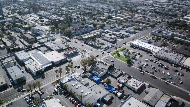 Aerial timelapse of an intersection in Costa Mesa, California with high traffic during the day.