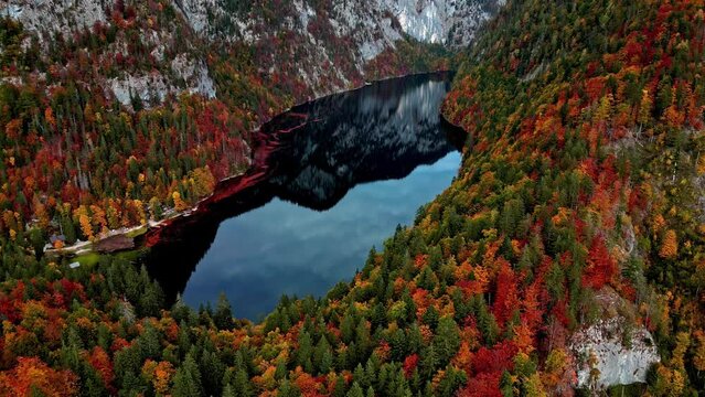Lake Toplitz aerial view. reflection on lake. colourful trees on mountain sides