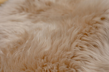 close up of a fur brown texture, fabric for making winter clothes, fluffy and warm