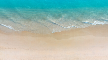 Fototapeta na wymiar Beach Wave water in the Tropical summer beach with sandy beach background