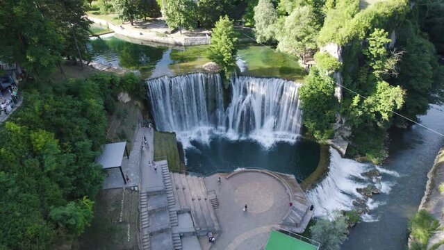 Beautiful waterfall Pliva, in Jajce, Bosnia and Herzegovina, aerial orbit
