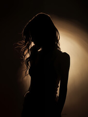 Obraz premium Backlit silhouette of pretty woman,created with Generative AI tecnology.