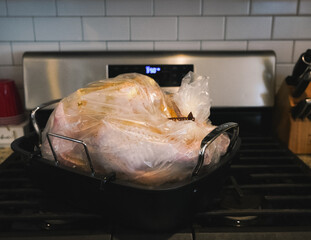 Raw turkey getting ready to go in the oven