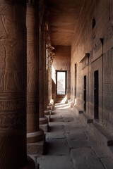 Columns covered with egyptian hieroglyphs in the Philae Temple