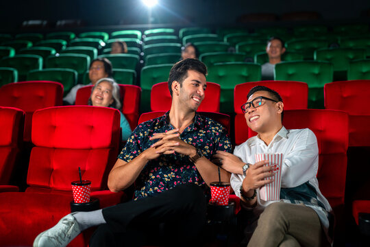 Group of friend of asian woman relax and go to Cimema in movie theater together