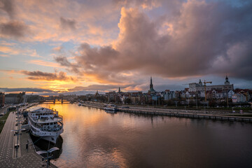 Panorama of Old town with reflection in river Oder at sunset, Szczecin, Poland - obrazy, fototapety, plakaty