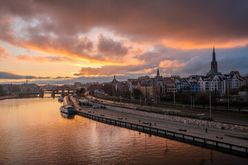 Panorama of Old town with reflection in river Oder at sunset, Szczecin, Poland