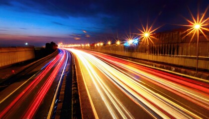Obraz premium Car motion trails. Speed light streaks background with blurred fast moving light effect