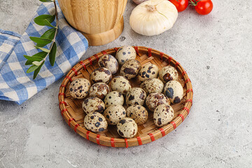 Raw quail eggs in the bowl