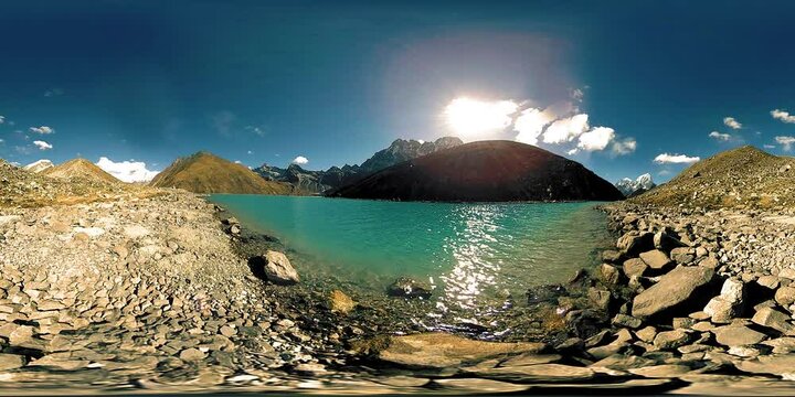 360 HD VR Gokyo Ri mountain lake at the winter season. Wild Himalayas high altitude nature and mount valley. Rocky slopes covered with ice.