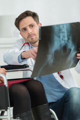 portrait of doctor checking the damaged bones