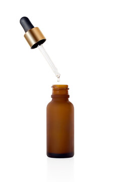 Open Dropper bottle with pipette for medical products, vape e liquid, oil, serum and essence. Brown glass cosmetic bottle