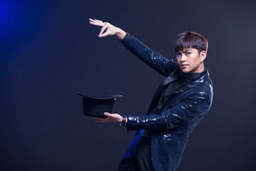 Young magician performing magic trick