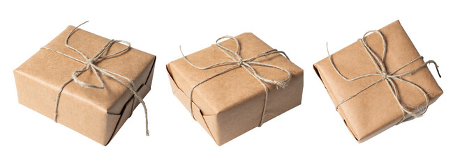 Gift wrapped in rustic paper tied with sisal twine, isolated on white or transparent background cutout. - obrazy, fototapety, plakaty