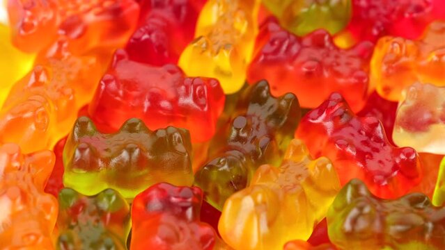 Sweet colorful gummy candy close up, rotation