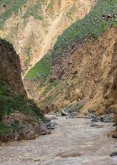 Close up of the Colca River. Spectacular and amazing beautiful panorama of the Andes Mountains in the Colca Canyon, Peru.