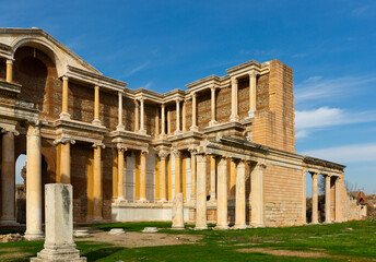 Fototapeta na wymiar Ruins of gymnasium at Sardis ancient city in sunny day, Manisa Province, Turkey