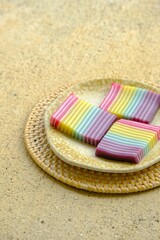Layered and colorful cake slices. Traditional cake made from rice flour and coconut milk. Kue lapis