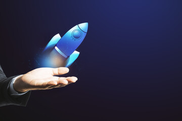 Hand cradling a launching digital rocket. Business growth and startup concept