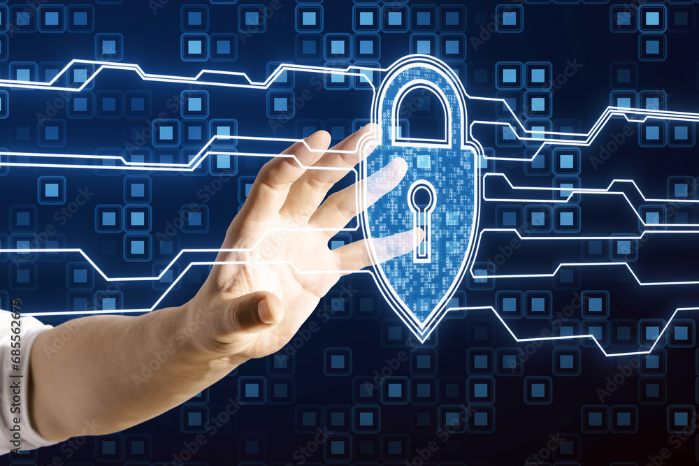 Aufkleber Close up of male hand using creative web protection sign with binary coding on dark background. Web safety and security, shield, padlock and antivirus concept.