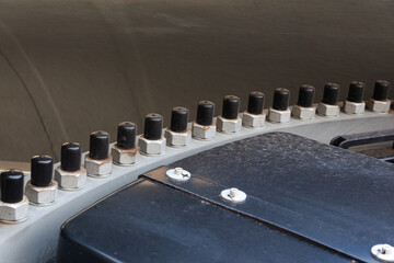 Close-up of a steel structure with a large number of bolted connections.