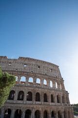 Obraz premium Exterior Panorama of the Roman Colosseum on a sunny day in Rome, Italy