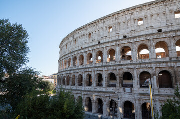 Fototapeta na wymiar Exterior Panorama of the Roman Colosseum on a sunny day in Rome, Italy