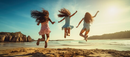 Youthful companions joyfully leaping by the shore copy space image