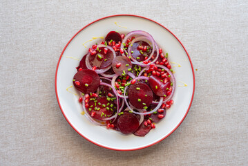 Beetroot Pomegranate Salad with honey sauce for Jewish holiday Rosh Hashanah.