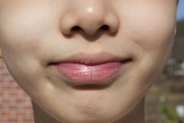 Naklejka premium It is a smiling face of an Asian child.