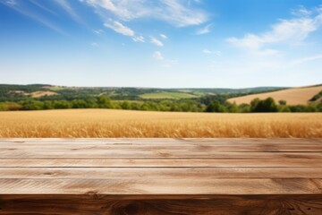 empty wooden table top for product display montages with blurred sunny wheat field view background