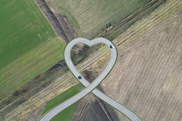 Heart shaped road, as a symbol of love and care.