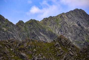 Obraz premium High and rocky mountains in the summer season. Landscape with the wild Carpathians of Romania
