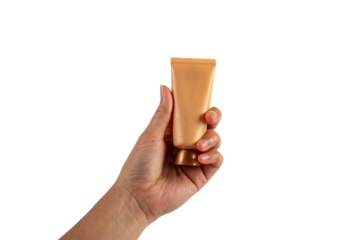 Plastic tube for cream or lotion in hand. Skin care or sunscreen cosmetic on transparent background.