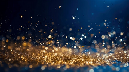 Abstract blue and gold shiny Christmas background with bokeh. Holiday bright blurred backdrop with particles.