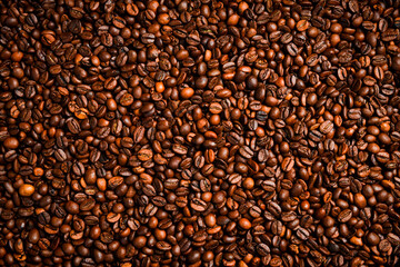 Arabica or Robusta coffee beans. Coffee background. Free space for text. Top view.