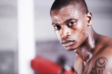 Foto op Canvas Man, boxer and portrait in gym, sweat and face for workout, boxing and strong. Exercise, sports and training for power, self defense and concentration for challenge, mma and fighting skills © Marine Gastineau/peopleimages.com