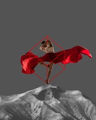 Muscular young man, ballet dancer dancing with red silk fabric over monochrome mountains with...