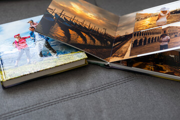 Two of the photo album is decorated in a beautiful photobook. Presented on a white background. - obrazy, fototapety, plakaty