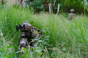 Soldier in civil war, ruined building.