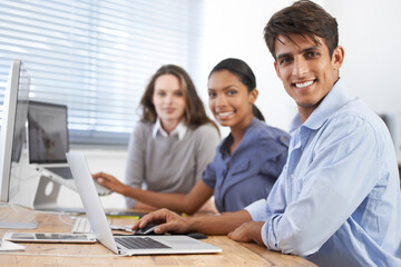 Obraz premium Business people, laptop and smile in portrait, discussion and collaboration on project or proposal. Staff, technology and internet connection for online research for company, support and teamwork