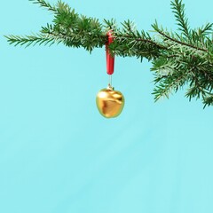 Closeup Golden Apple Ornament Christmas decoration hanging on Christmas tree on blue background. 3D Rendering Christmas concept idea.