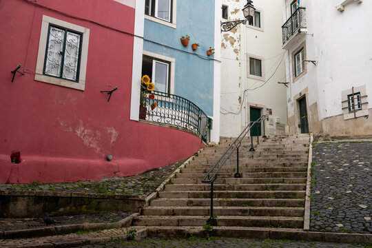 Typical street in Lisbon, colorful buildings 