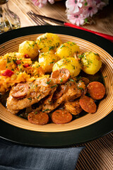 Stewed turkey meat with chorizo sausage.