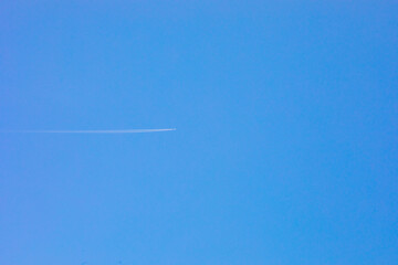 airplane in the blue sky