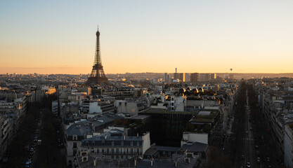 Majestic view of Paris, capital of France, at sunset and with the Eiffel Tower