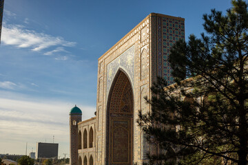 the sun reflection in the evening time in a beautiful historical building in Central Asia, Registan square, Samarkand, madrasah.